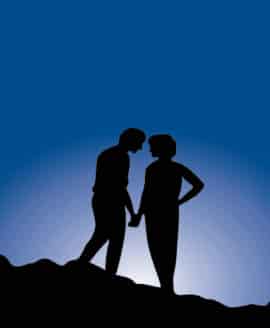 Relationship astrology readings available in London, UK and all around the UK or globally, silhouette of a couple under a dark blue nights sky